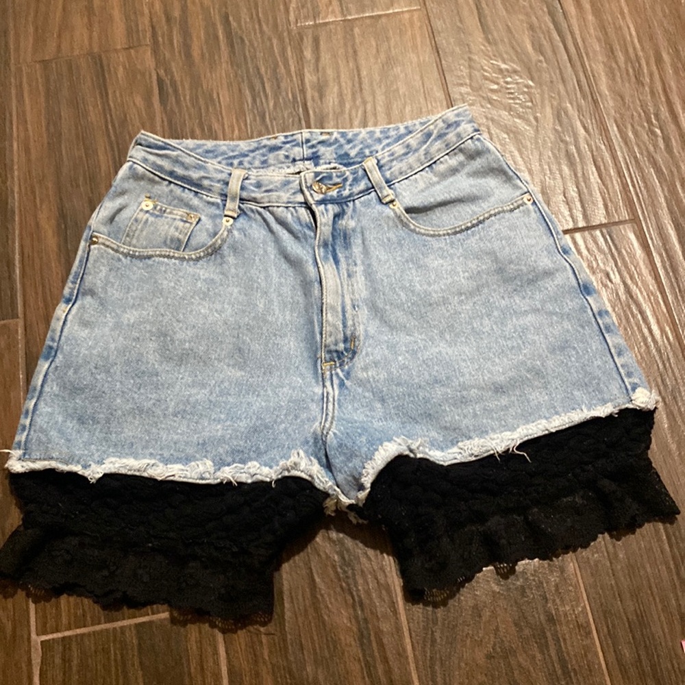 New age denim vintage shorts with lace attached 80s or 90s style urban hipsters